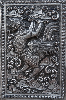 Art on silver, in a Thai temple.
