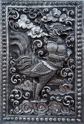 Art on silver, in a Thai temple.