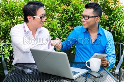 Asian Businessmen working outdoor