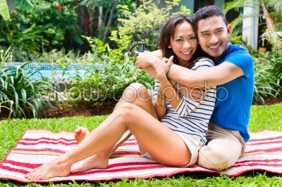 Asian couple outdoor in the garden
