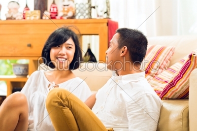Asian people couple in living room