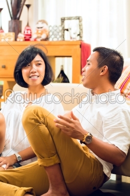 Asian people couple in living room