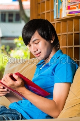 Asian student reading book or textbook learning