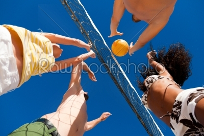 Beach volleyball - players on the net