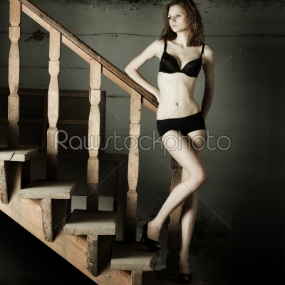 Beautiful woman on a stairs