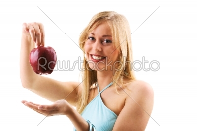 blond holding apple