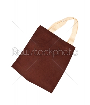 Brown cotton bag on white isolated background. 