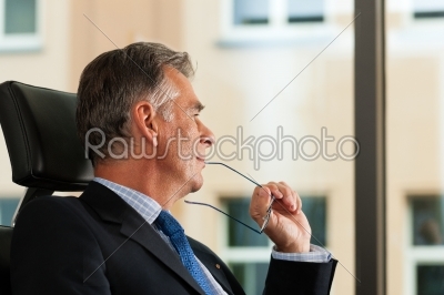 Business - Boss contemplating in his office