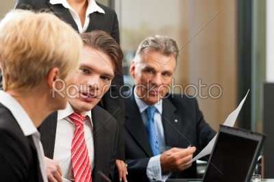 Business - team meeting in an office