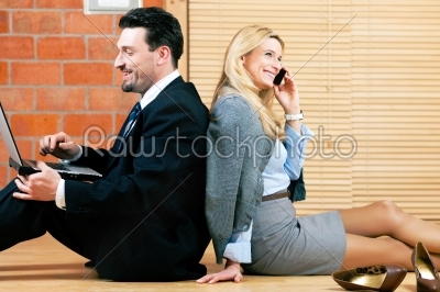 Business couple is working at home