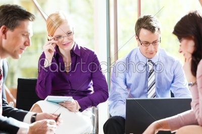 Business people having meeting in office