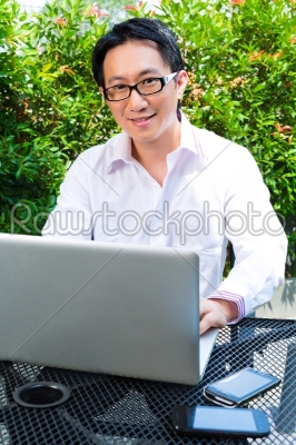 Chinese Businessman working outdoor
