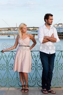 City tourism - couple in vacation having discussion
