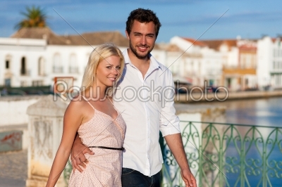 City tourism - couple in vacation on bridge