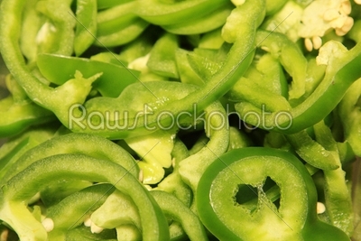 Close up of green paprika cut to pieces