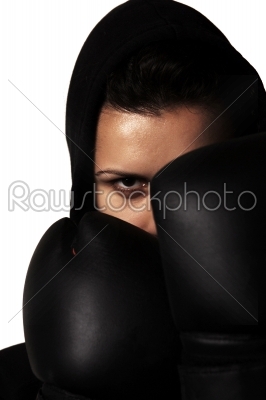 closeup  portrait of girl with black boxing gloves  