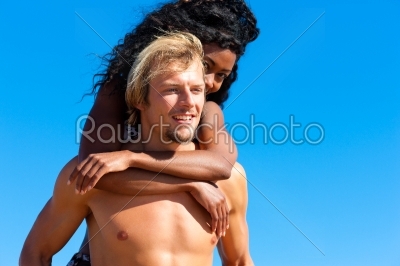 Couple in summer at the beach