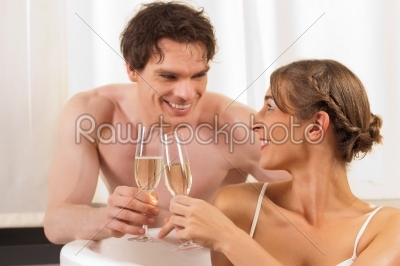 Couple is doing wellness with champagne