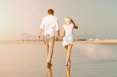 Couple on the beach in summer vacation