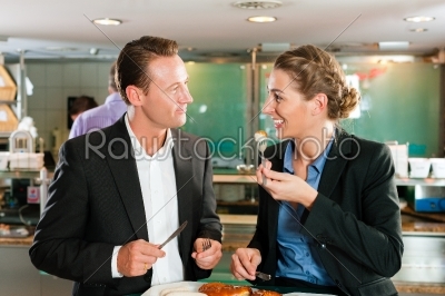Couple with snack for breakfast