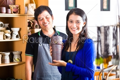 Customer in an Asian Pottery shop