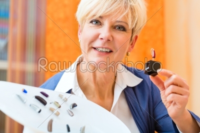 Deaf woman with hearing aid