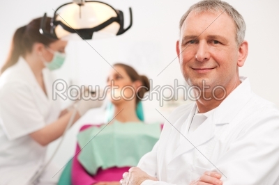 Dentist in his surgery