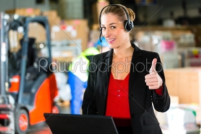 dispatcher using headset at warehouse of forwarding