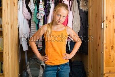 Family - child in front of her closet or wardrobe