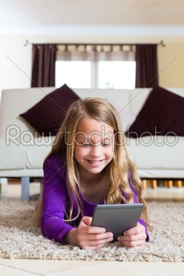 Family - child reading an E-Book