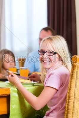 Family eating lunch or dinner