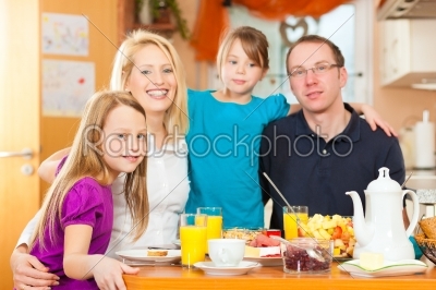 Family having food for breakfast