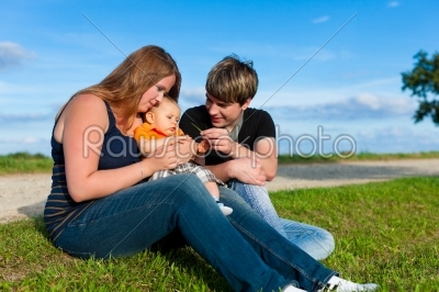 Family in summer - Mother, father and child