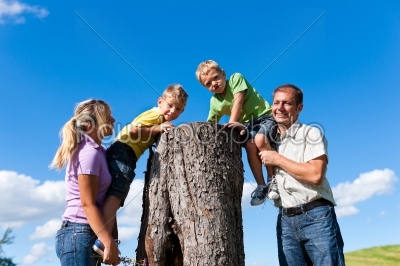 Family on excursion in summer