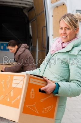 Female friends loading a moving truck