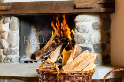 Fireplace in a hunter_qt_s cabin or alpine hut