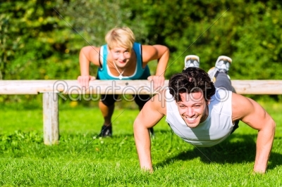 Fitness people doing pushups for sport
