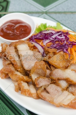 fried pork on white plate
