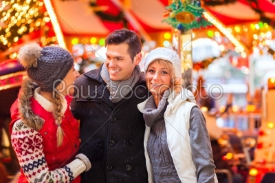 Friends during  the Christmas market or advent season