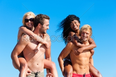 Friends in vacation at the beach