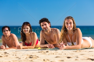 Friends on beach vacation in summer