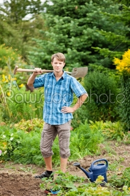 Gardener holding showel