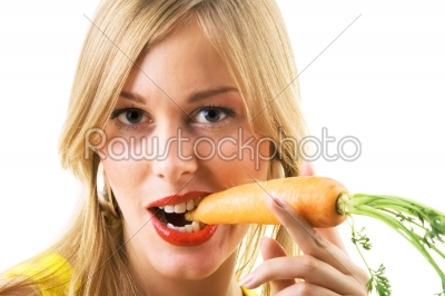 Girl eating carrot
