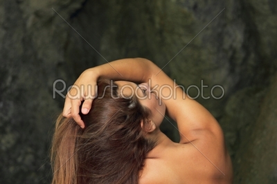 girl enjoying a waterfall
