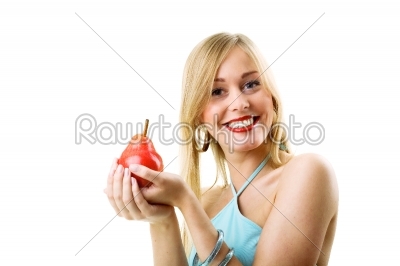 Girl holding pear in hands