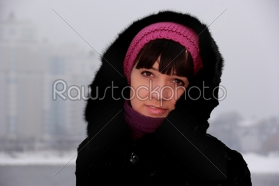 girl in a fur coat in winter