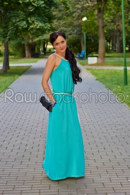 girl in evening dress in the Park