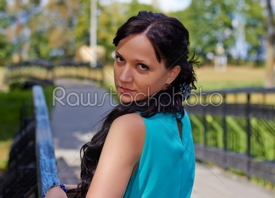girl in evening dress in the Park