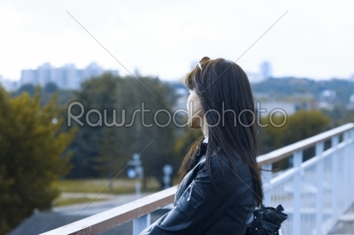 Girl on a background of the city