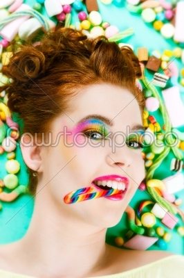 Girl with sweet goodies and candy
